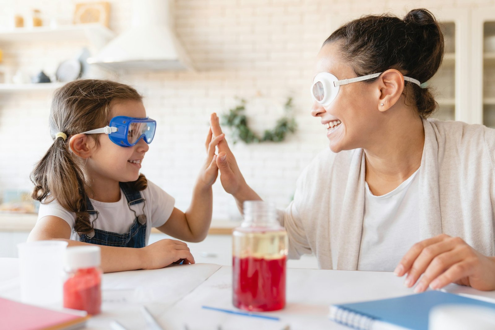 Home scientific experiment with chemical substance for school project homework. Lab test in kitchen