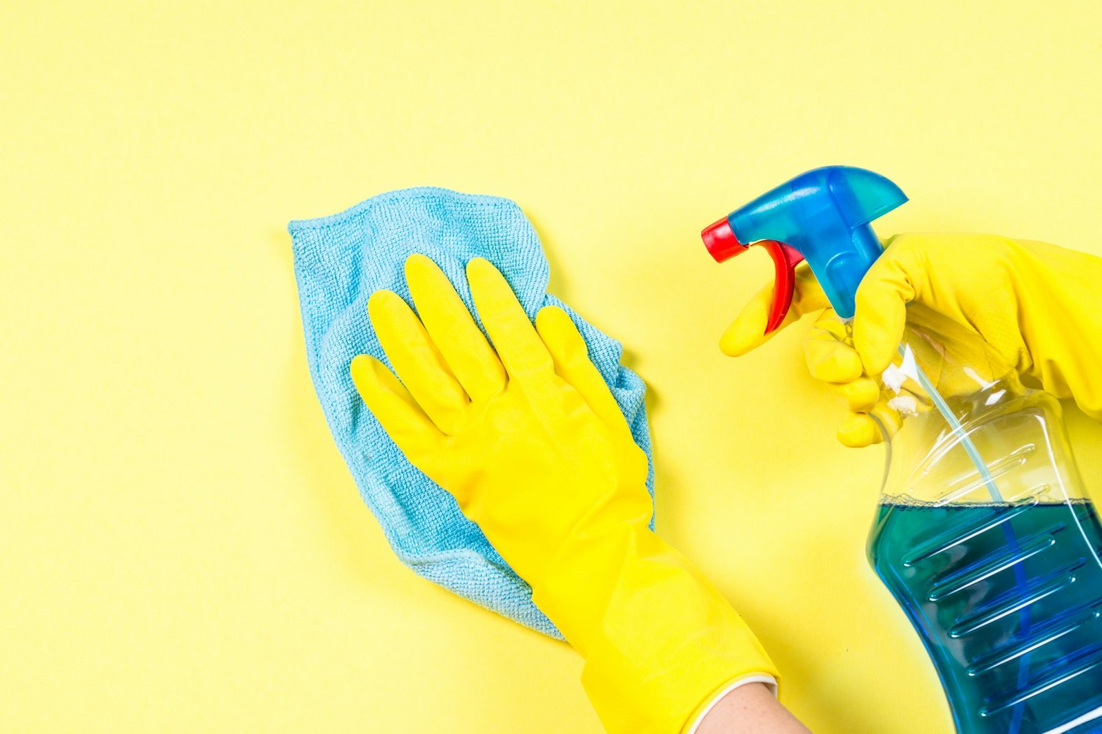 Cleaning concept with microfiber rag, gloves and cleaning spray agent